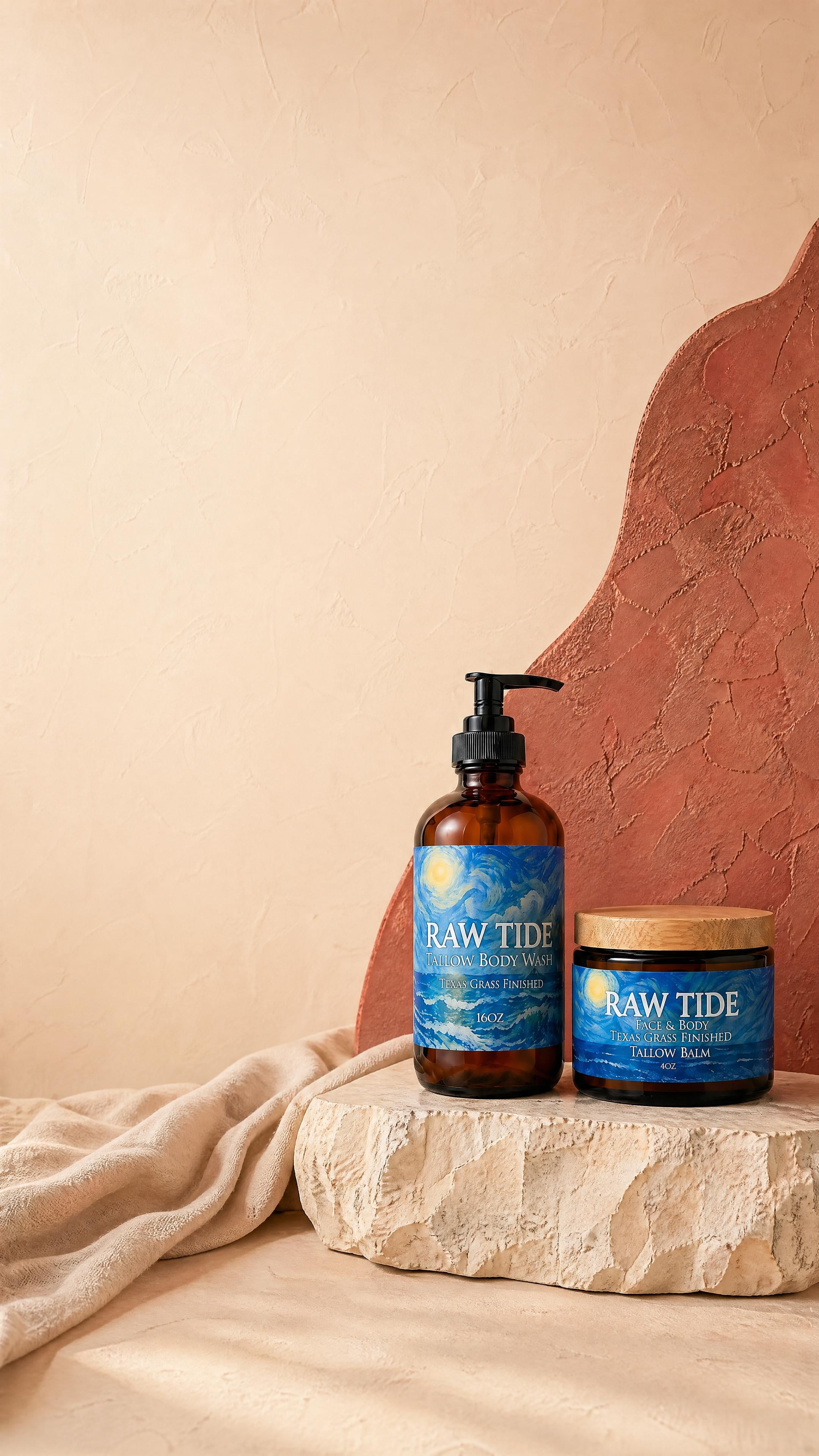 Raw Tide Body Wash and Face and Body Balm on a warm cream stone ritual backdrop